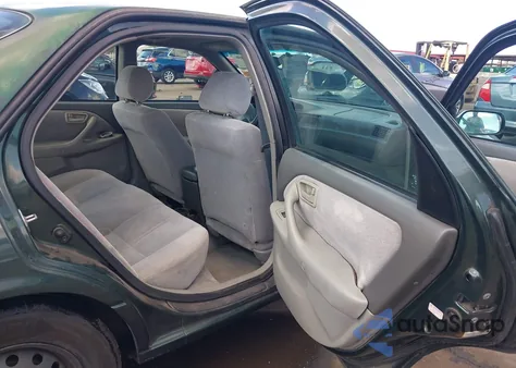 1999 Toyota Camry Le from USA, damaged, VIN 4T1BG28K3XU414667